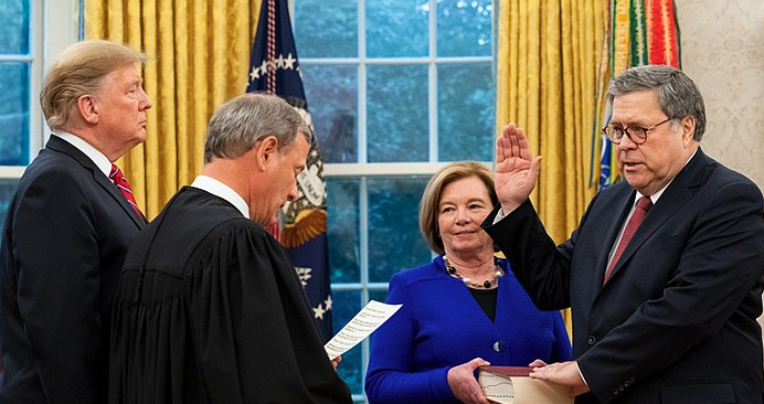 US Attorney General William Barr taking the oath of office - his wife, Catherine, Chief Justice Roberts and Donald Trump are in the photo